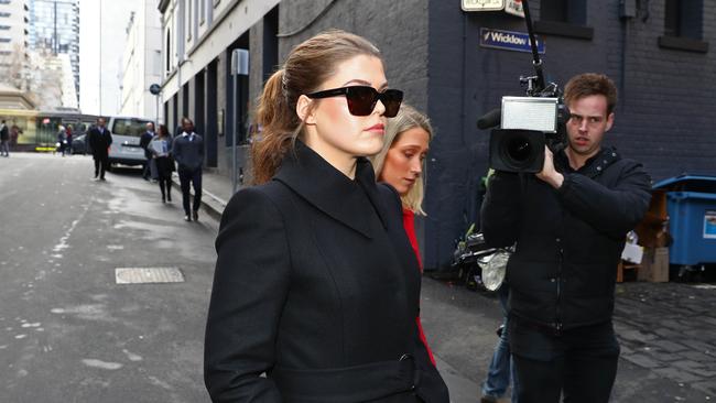 Belle Gibson leaves the Federal Court in Melbourne flanked by her legal team. Picture: Aaron Francis/The Australian