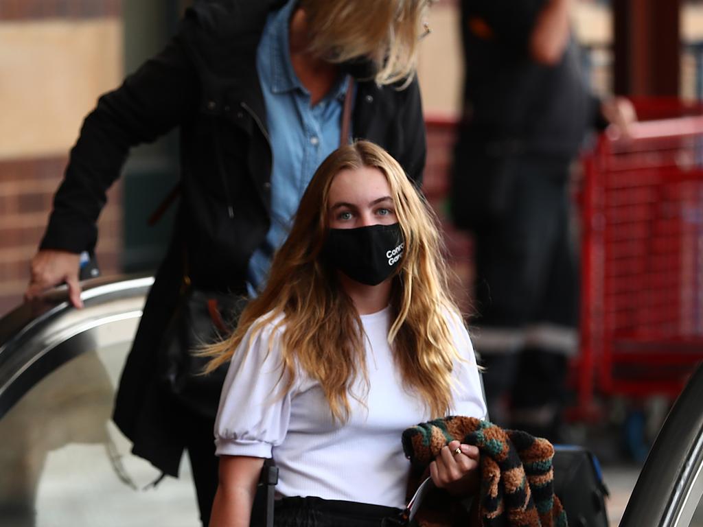 Commuters wear face masks at Central Station in Sydney. Picture: Mark Metcalfe