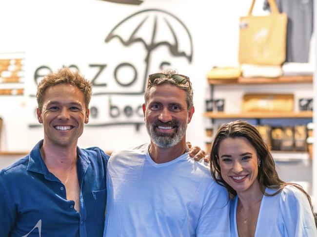 Lincoln Lewis (Left) and Rhiannon Fish (Right) with Enzo’s by the Beach owner Enzo Andreuzzii.