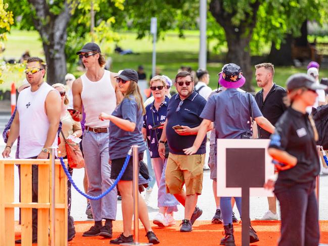 The first people come through the gates of the Taste of Summer at PW1 on Hobart waterfront. Picture: Linda Higginson