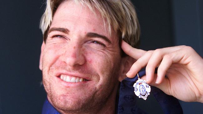 Jason Akermanis with his Brownlow Medal in 2001.