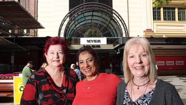 Former Myer workers Sandra Hewitt, Maureen Cuskelly, and Ann Martinez, gather outside Myer Centre, which is closing at the end of the month. Picture: Liam Kidston