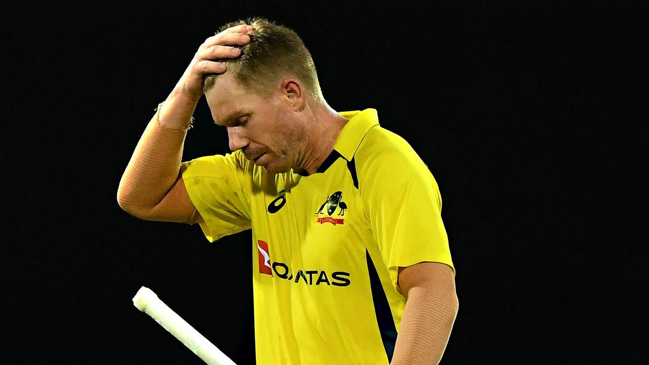 David Warner walks back to the pavilion after his dismissal. Photo by AFP