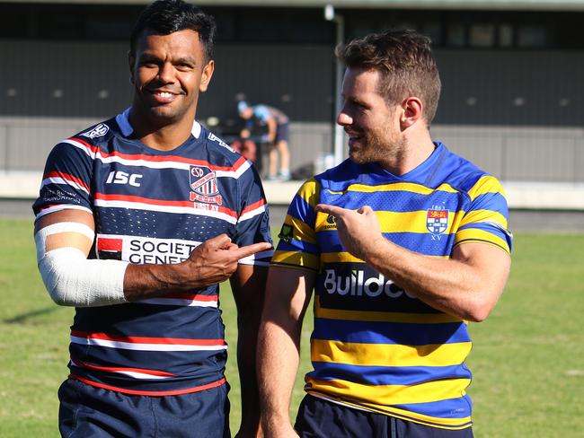 Kurtley Beale and Bernard Foley at Waratahs training in their club jerseys.