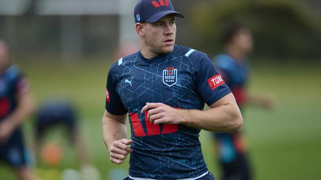 KATOOMBA, AUSTRALIA - JUNE 01: Matt Burton warms up during a New South Wales Blues State of Origin training session at Blue Mountains Grammar School on June 01, 2024 in Katoomba, Australia. (Photo by Brett Hemmings/Getty Images)