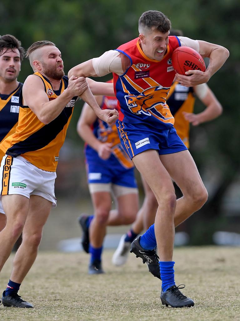 Essendon District: Strathmore’s Tierone Cuffe attempts to tackles Maribyrnong Park’&#149;s Mitchell Comben. Picture: Andy Brownbill