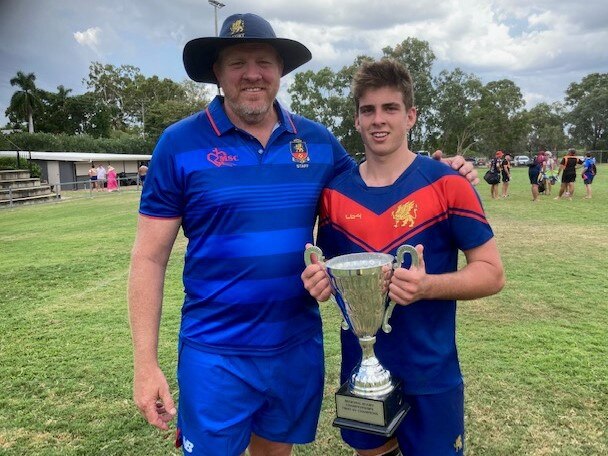 Downlands coach Garrick Morgan with co-captain and former Central Queensland product Rhys Chadburn after the team took out the Regional Rugby Championships at the weekend.