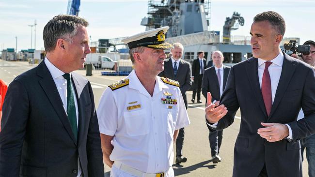 Richard Marles, Vice-Admiral Jonathan Mead and South Australian Premier Peter Malinauskas discuss the build of the AUKUS submarines at the Osborne Naval Shipyard. Picture: NCA NewsWire / Brenton Edwards