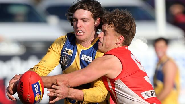 North Warrnambool Eagles player Bailey Jenkinson fights for the ball with South Warrnambool’s Archie Stevens earlier this season. Picture Yuri Kouzmin