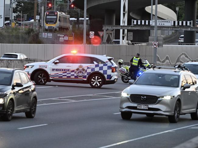 Police stopping traffic entering the Legacy Tunnel at Kelvin Grove after a crash closed the tunnel in both directions. Picture: Lyndon Mechielsen