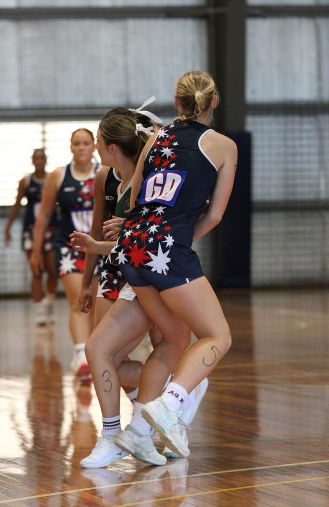 Netball action from QISSN 2024, Townsville. Chisholm Catholic College Cornubia v Aquinas College Ashmore