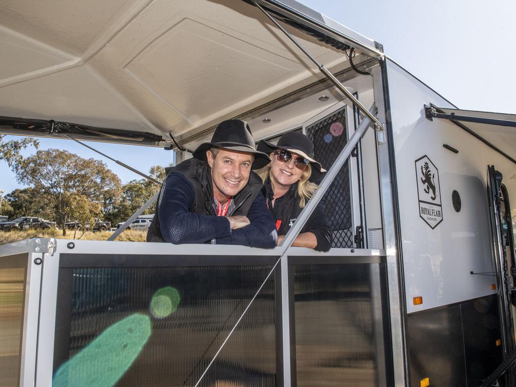 Michael Higgs and Fiona Bann from Caravan HQ relax on the deck of the Royal Flair at the Queensland Outdoor Adventure Expo, Toowoomba Showgrounds. Friday, July 29, 2022. Picture: Nev Madsen.