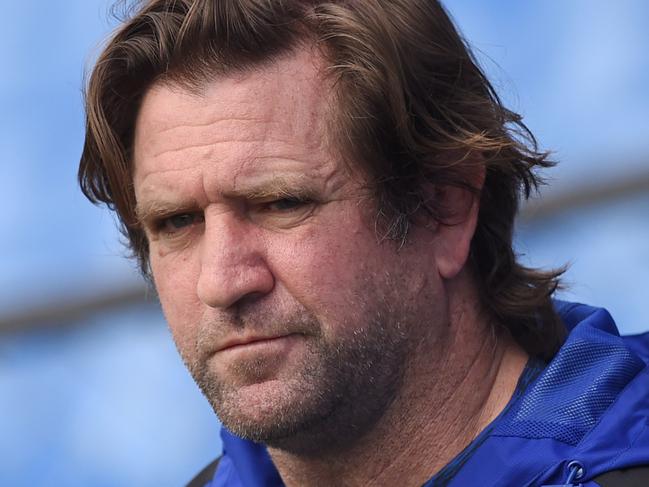 **FILE** A Wednesday, September 7, 2016 image reissued Tuesday, September 19, 2017 of Canterbury-Bankstown Bulldogs NRL coach Des Hasler during a training session in Sydney. Canterbury have sacked coach Des Hasler from the NRL club. Hasler signed a two-year contract extension with the club in April, but failed to take the team to the finals for the first time since his arrival in 2012. (AAP Image/Paul Miller) NO ARCHIVING