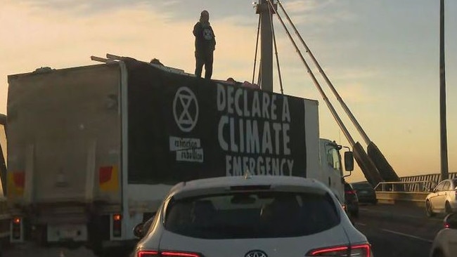 Climate protesters have caused peak-hour chaos after blocking a major bridge in Melbourne. Picture: Supplied.