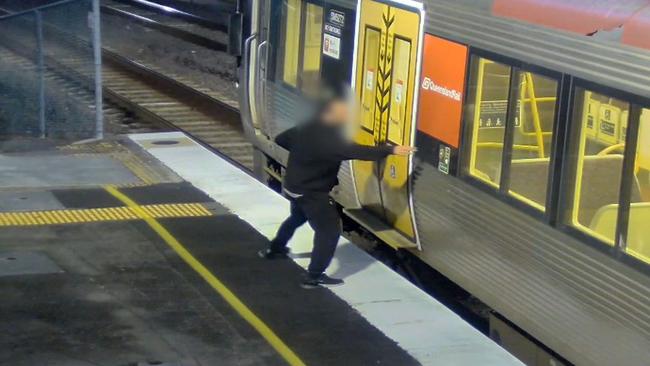 Moments after making it onto the platform, the man is seen calmly boarding the train. Picture: Queensland Rail