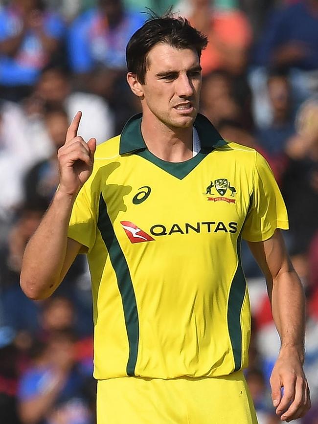 Australia cricketer Pat Cummins celebrates the wicket of India cricketer Shikhar Dhawan last month. Picture: Prakash Singh / AFP