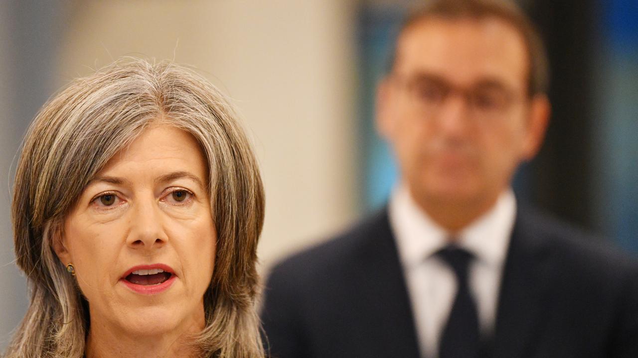 Dr Nicola Spurrier speaks to the media as South Australian Premier Steven Marshall looks on at the Royal Adelaide Hospital in Adelaide, Wednesday, March 25, 2020. Photo: David Mariuz / AAP.