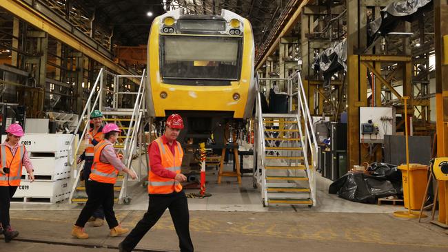 Workers inside the Downer rail manufacturing facility at Maryborough on Monday. Picture: Lachie Millard