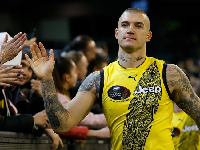 MELBOURNE, AUSTRALIA - JUNE 02: Dustin Martin of the Tigers thanks fans during the 2018 AFL round 11 Dreamtime at the G match between the Essendon Bombers and the Richmond Tigers at the Melbourne Cricket Ground on June 02, 2018 in Melbourne, Australia. (Photo by Adam Trafford/AFL Media/Getty Images)