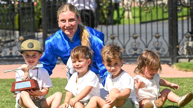 Dean Holland’s children presented Jamie Kah with the Dean Holland Trophy after the Newmarket Handicap. Picture: Vince Caligiuri/Getty Images