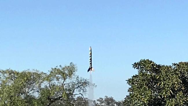 Ma Ma Creek School Chaplin Tim Ormiston launched rockets with students to mark the official implementation of the school&#39;s Positive Learning Program. Picture: cONTRIBUTED