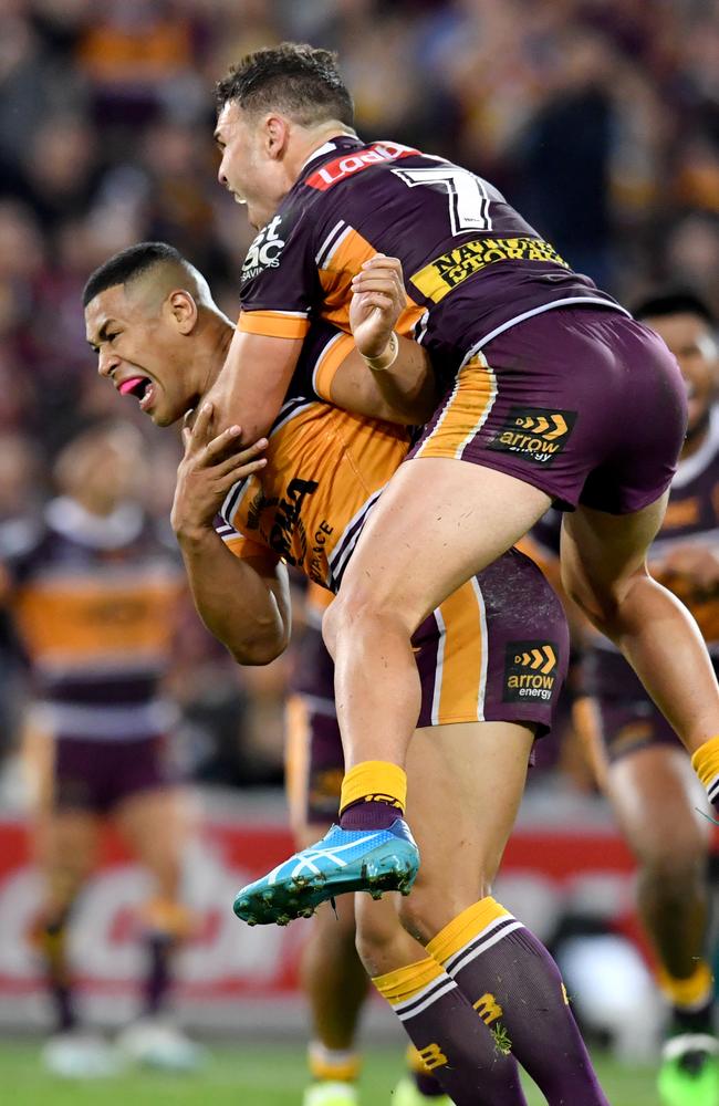 Sean O’Sullivan jumps on Jamayne Isaako after the winning kick. Picture: AAP Image/Darren England