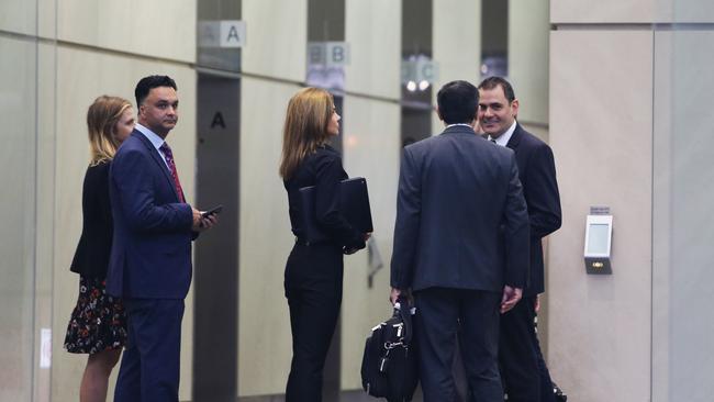 Magnis US managing director Hoshi Daruwalla (left), chair Frank Poullas and an unidentified woman arrive for the AGM. Picture: John Feder