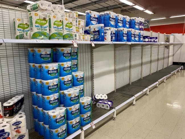 Near-empty shelves of toilet paper at a supermarket in Melbourne. Picture: William West/AFP