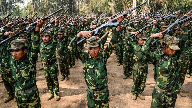 Members of the Ta'ang National Liberation Army train at their base camp in the forest in Myanmar's northern Shan State. Picture: AFP