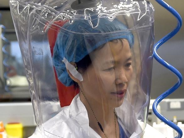 WUHAN, CHINA - FEBRUARY 23 2017: Virologist Shi Zheng-li, left, works with her colleague in the P4 lab of Wuhan Institute of Virology (WIV) in Wuhan in central China's Hubei province Thursday, Feb. 23, 2017.- PHOTOGRAPH BY Feature China / Barcroft Studios / Future Publishing (Photo credit should read Feature China/Barcroft Media via Getty Images)