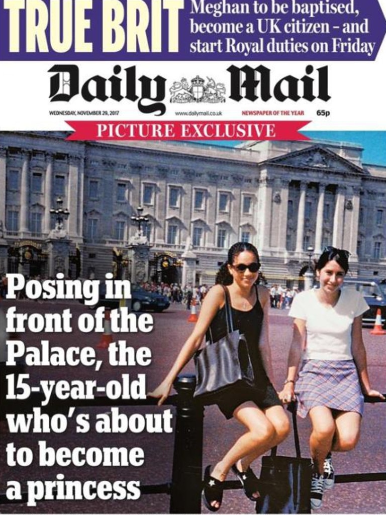 Meghan Markle and friend Ninaki Priddy pose in front of Buckingham Palace.