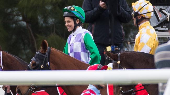 Wolf Creek star Teresa Palmer sporting Michelle Payne’s famous Melbourne Cup winning silks. Picture: Splash