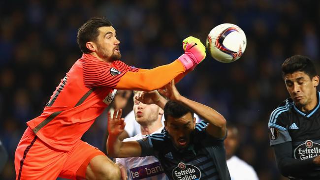 Mathew Ryan of Genk punches the ball.