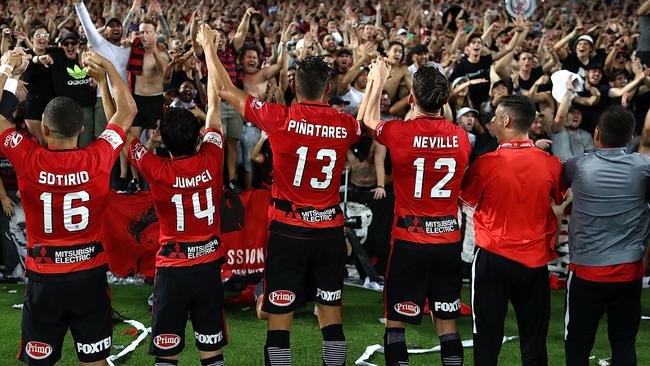 Wanderers fans celebrate with the players.