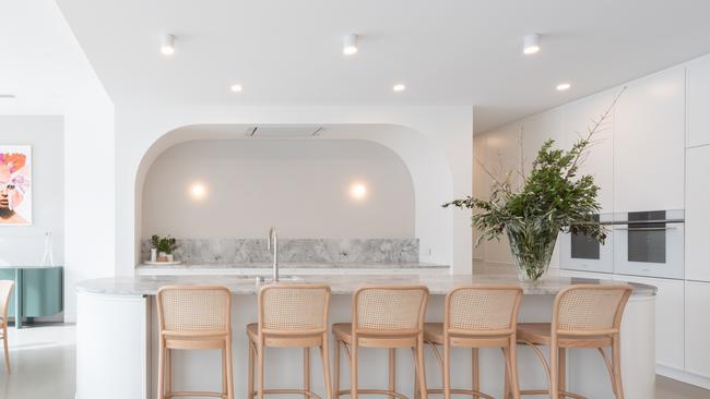 Here’s a break from all of those hard right angles we’ve shown so far. This Mediterranean-style kitchen is sure to give you all kinds of vibes.