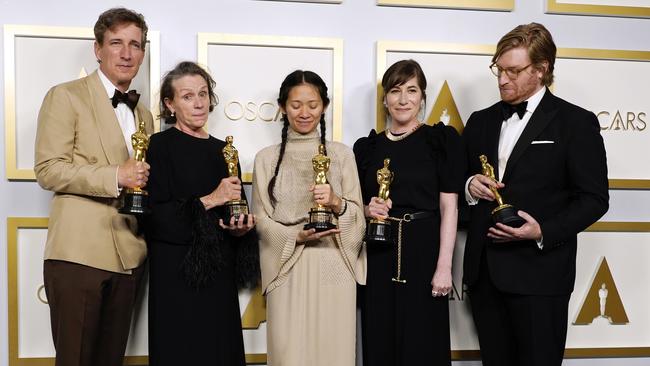 Peter Spears, Frances McDormand, Chloe Zhao, Mollye Asher, and Dan Janvey, winners of Best Picture for "Nomadland," pose in the press room at the Oscars on Sunday, April 25, 2021, at Union Station in Los Angeles. Picture: Getty