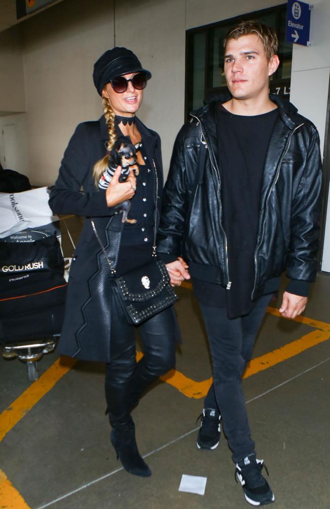 Paris Hilton and Chris Zylka were spotted holding hands at LAX on Sunday. Picture: starzfly/Bauergriffin.com