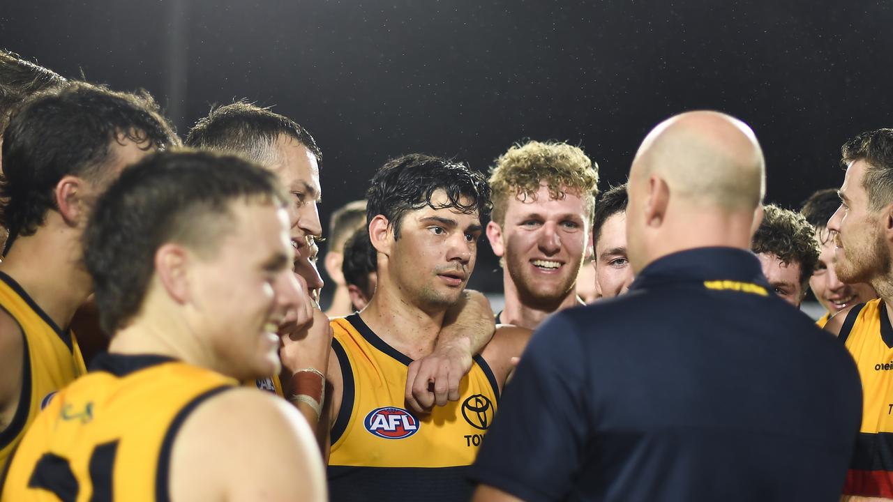 Crows coach Matthew Nicks speaks to his players after their thrilling victory over the Saints in Cairns. Picture: AFL Photos/via Getty Images