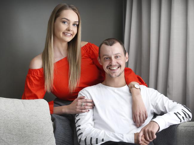 Jessy Carroll, 25, with girlfriend Bianca Moverley. Picture: David Caird