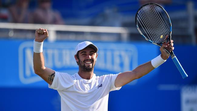 Sydney’s Jordan Thompson celebrates winning his first round match against Britain’s Andy Murray at Queens.