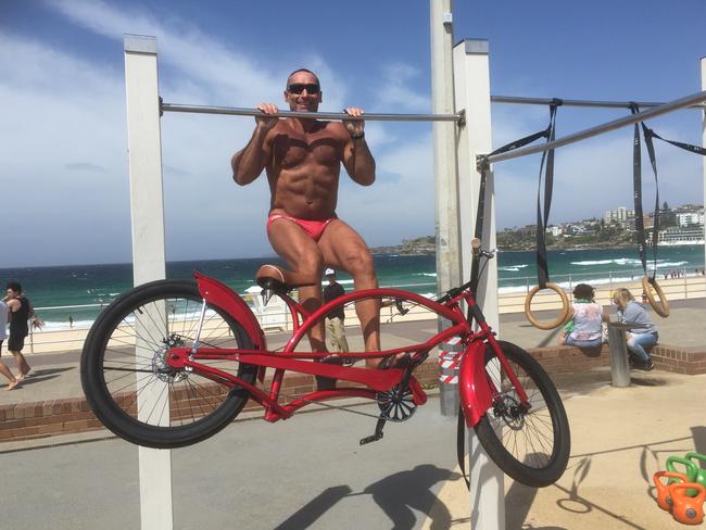 Bondi icon Dimitri Moskovich in his budgy smugglers. Picture: Kristi Miller