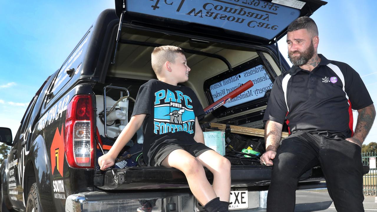 James Evers-Watson and son, Toby, 8, after a trailer was stolen outside their family home. Picture: Dean Martin