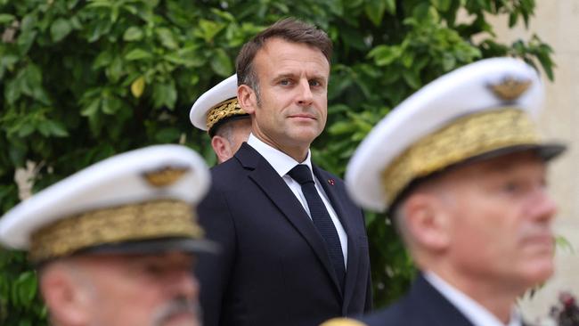 France's President Emmanuel Macron attends a ceremony to review troops in July in preparation for Bastille Day on the 14th. On the 7th, he faces the second round of legislative elections. Picture: Aurelien Morissard / pool / AFP