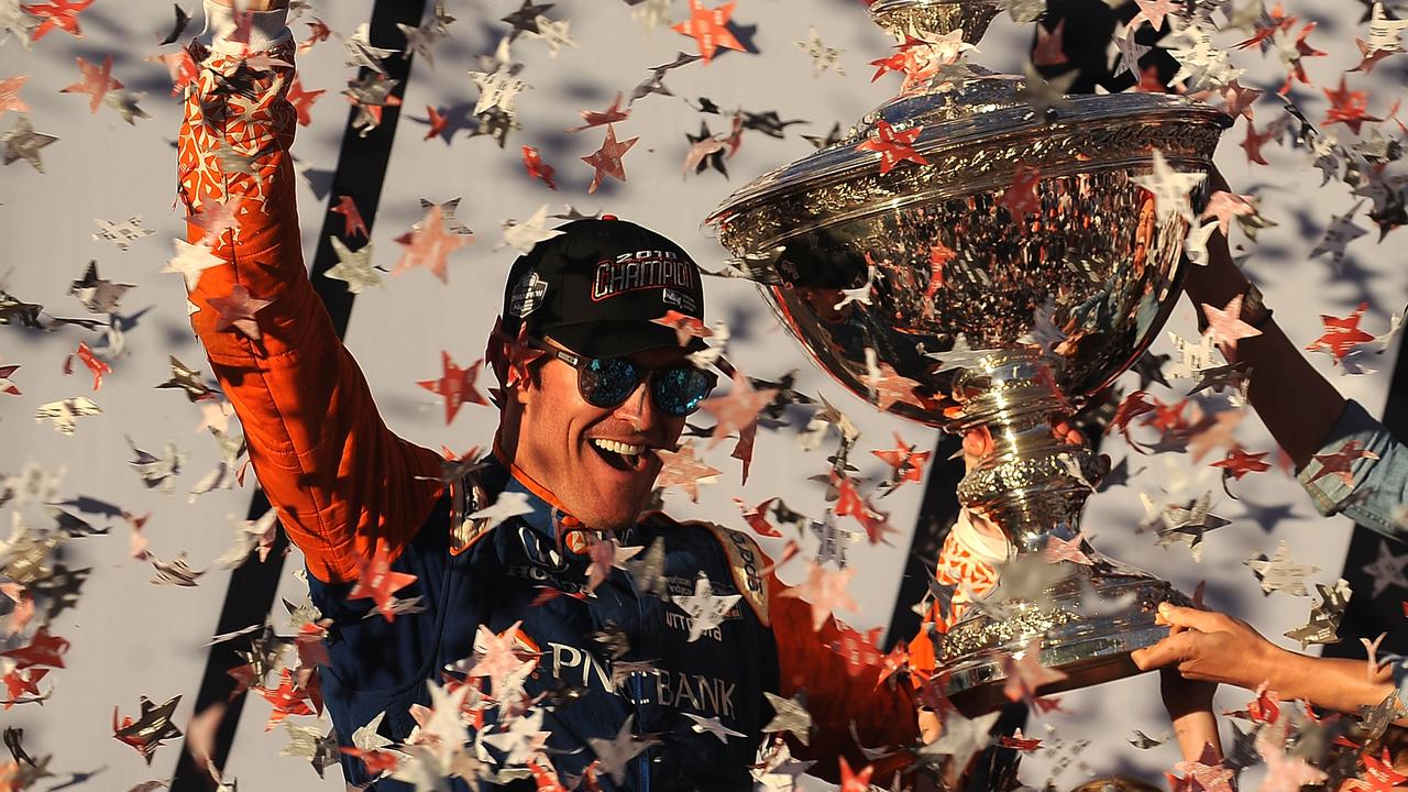 Scott Dixon celebrates his fifth IndyCar crown in 2018.