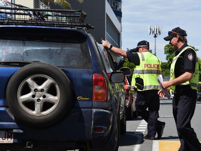 Queensland Police are preparing a strategy to respond to COVID-19 as well as the La Nina weather event. Picture: NCA NewsWire / Steve Holland