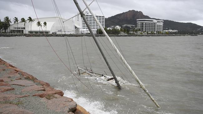 A sunken yacht is seen on January 26, 2024 in Townsville, as tropical Cyclone Kirrily made landfall near Townsville. Photo by Ian Hitchcock/Getty Images.