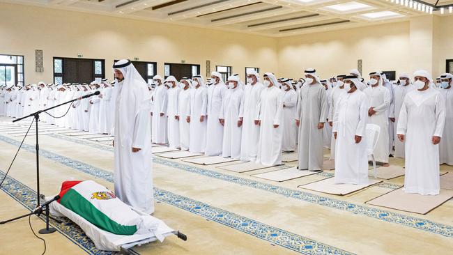 Mohammed bin Zayed al Nahyan leads the funeral prayer for his half brother Khalifa on Friday. Picture: AFP