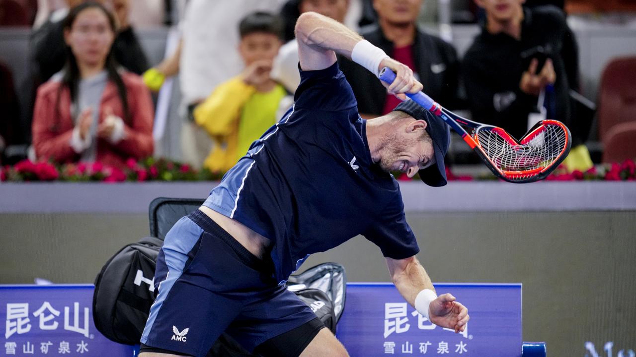 Andy Murray took out his anger on his racquets after losing to Alex de Minaur. (Photo by Fred Lee/Getty Images)