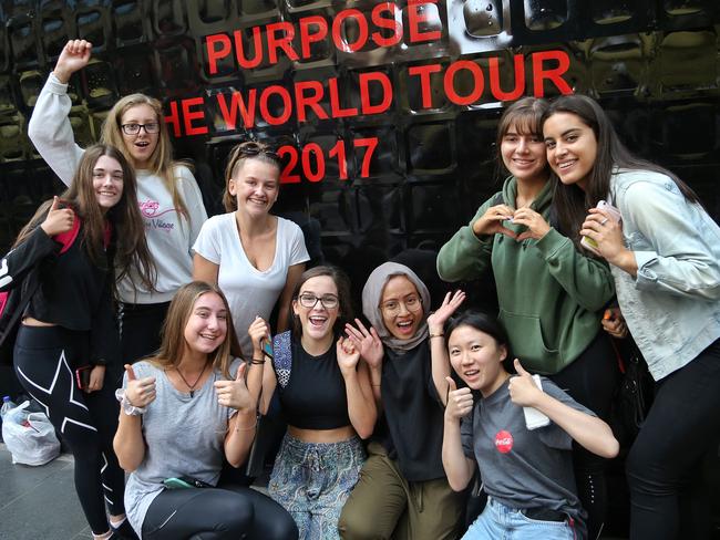 Fans queue to enter a Justin Bieber pop-up shop on Little Bourke Street. Picture: Hamish Blair