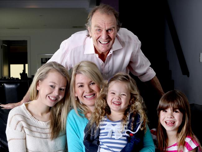 Graham, top, with wife Nicole Cornes and their daughters Amy, Gia and Charlize in 2012. Picture: File